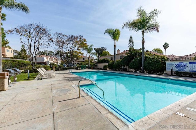 view of pool featuring a patio