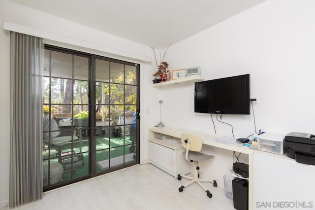 home office featuring hardwood / wood-style flooring