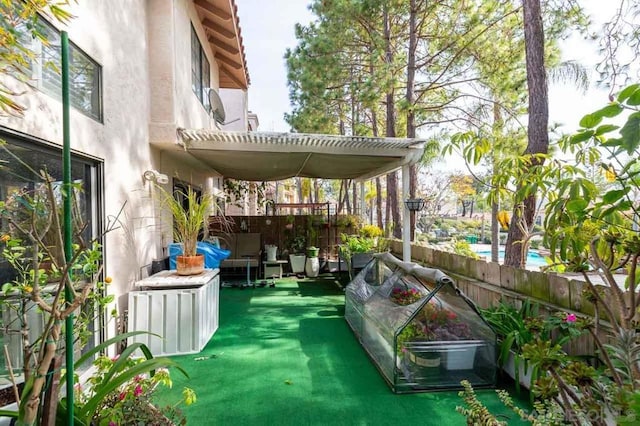 exterior space featuring area for grilling and a pergola