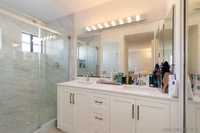 bathroom with vanity and walk in shower