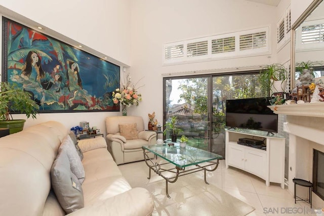 tiled living room with high vaulted ceiling