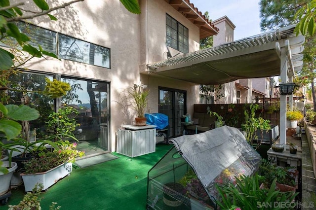 view of patio featuring a pergola