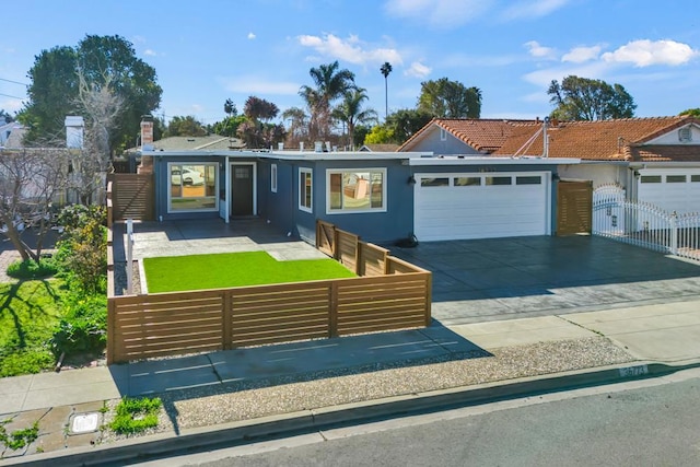 single story home with a garage