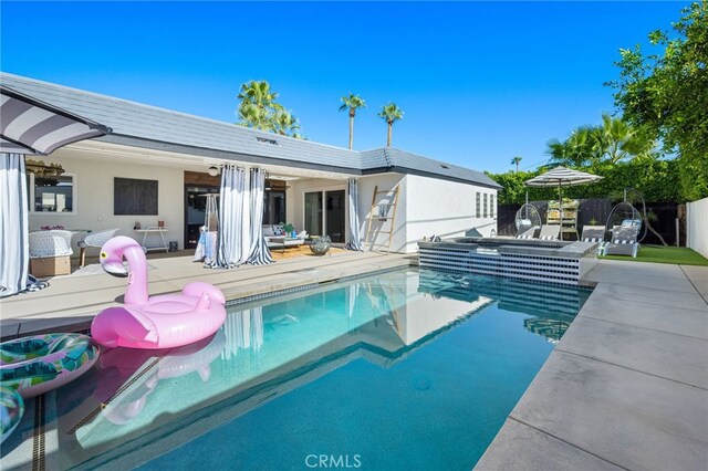 view of pool with a patio area