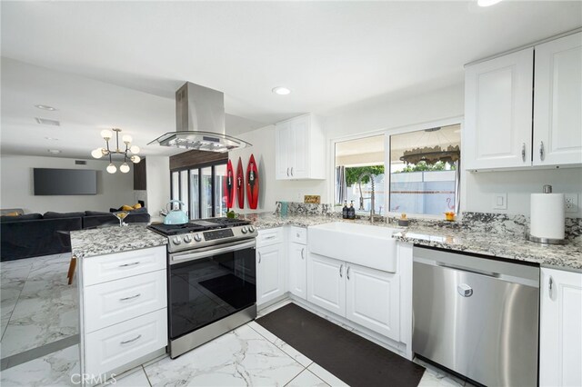 kitchen with white cabinetry, island exhaust hood, stainless steel appliances, and sink