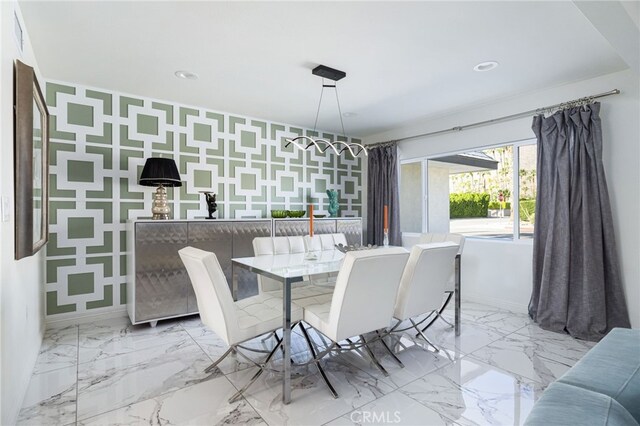 dining area with a chandelier