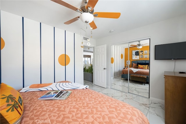 bedroom featuring a closet and ceiling fan