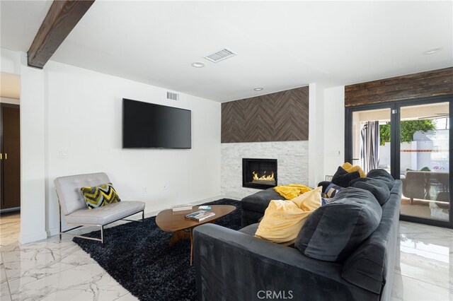 living room with a large fireplace