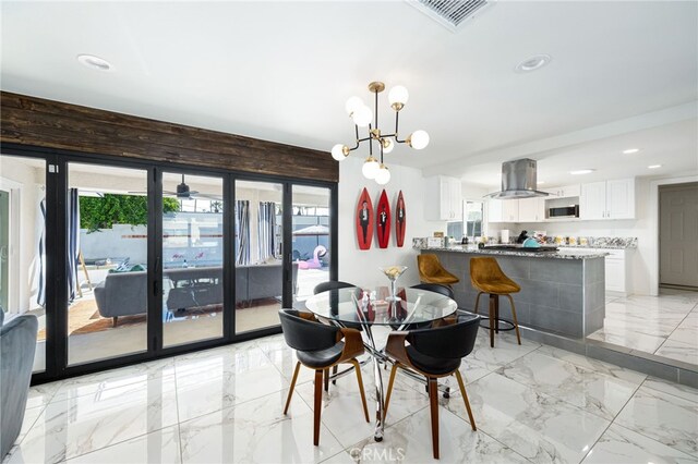 dining room with a chandelier