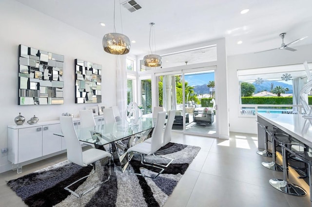 dining space with ceiling fan