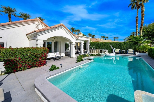 view of pool with an outdoor hangout area and a patio