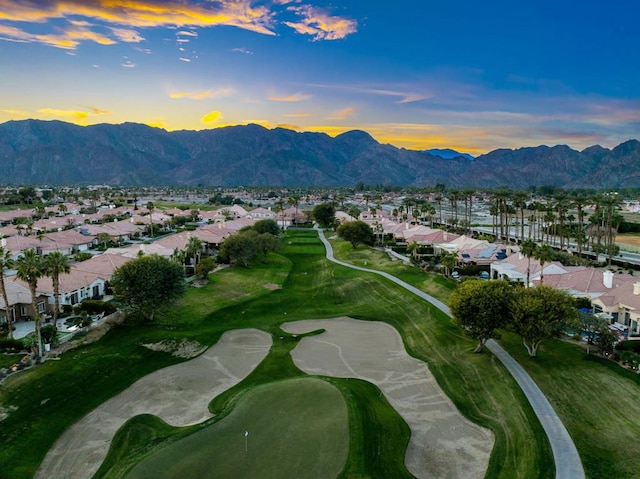 aerial view at dusk with a mountain view