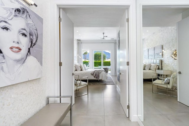 corridor featuring light tile patterned floors