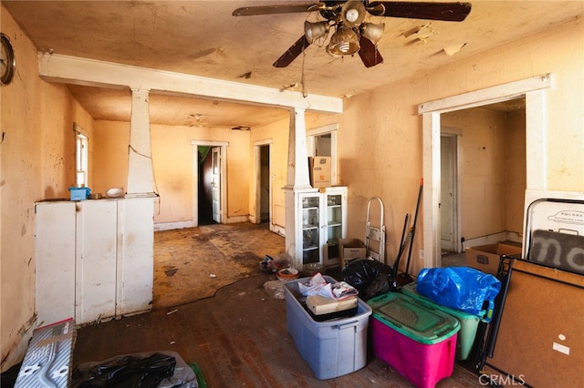 misc room with wood-type flooring and ceiling fan