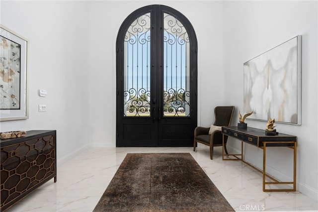 foyer entrance featuring french doors