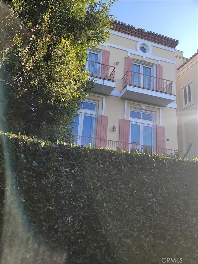 view of front of house featuring stucco siding