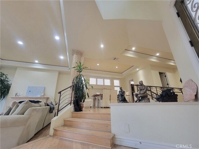 staircase featuring recessed lighting