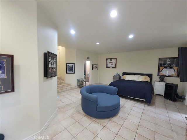 bedroom featuring baseboards, recessed lighting, and light tile patterned floors