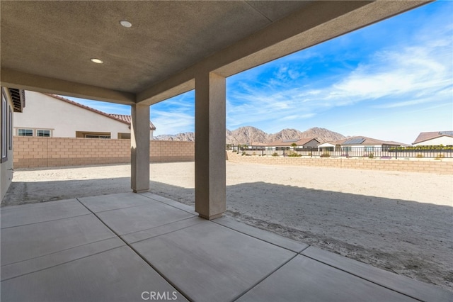 view of patio featuring a mountain view