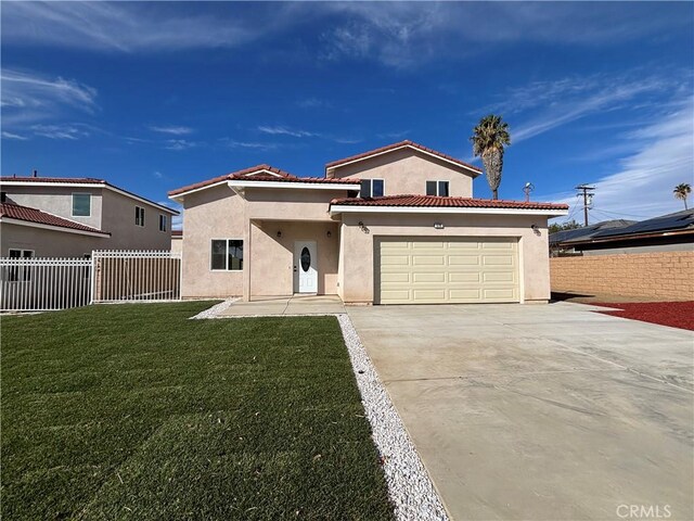 mediterranean / spanish-style house with a garage and a front lawn