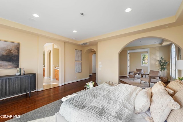 bedroom featuring dark hardwood / wood-style floors