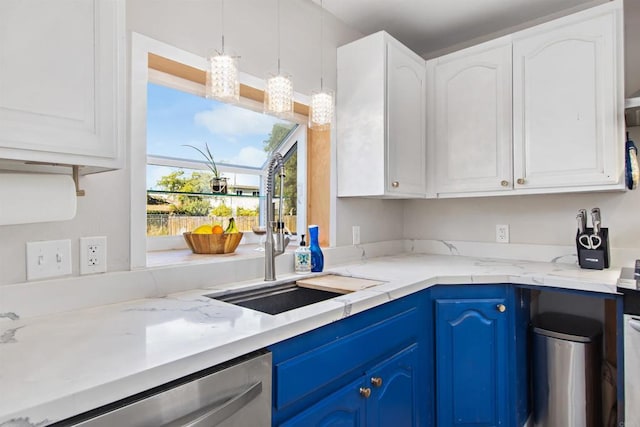 kitchen featuring sink, stainless steel dishwasher, white cabinets, and blue cabinets