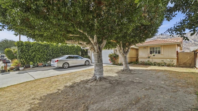 view of front of property with a garage