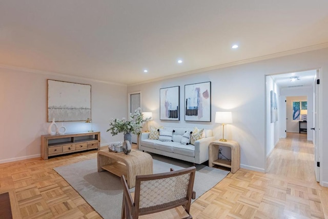 living room with ornamental molding and light parquet floors