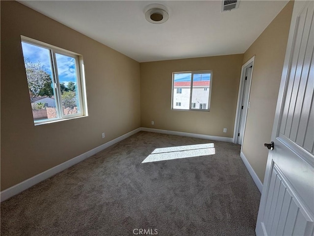 view of carpeted spare room