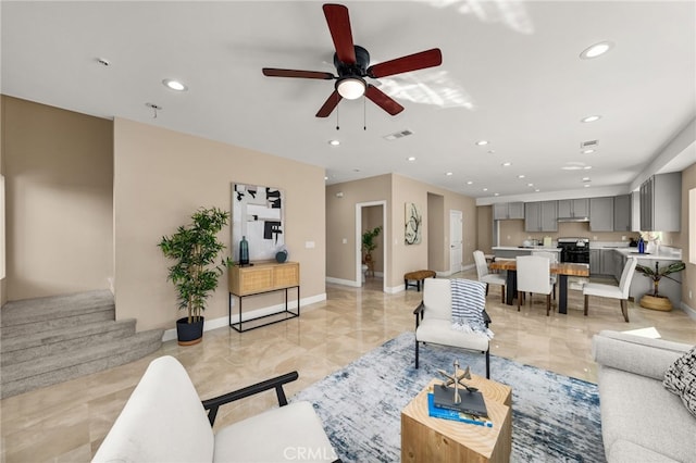 living room with marble finish floor, recessed lighting, visible vents, ceiling fan, and baseboards