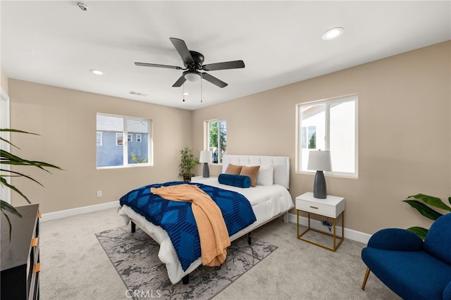 carpeted bedroom with baseboards, visible vents, ceiling fan, and recessed lighting