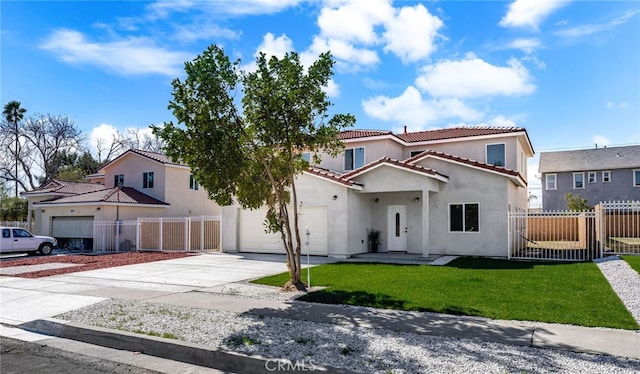 mediterranean / spanish-style house with a gate, fence, concrete driveway, and stucco siding