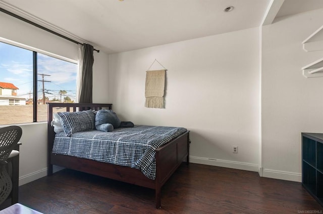 bedroom featuring dark hardwood / wood-style floors