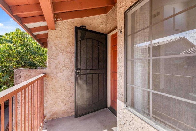 doorway to property with a balcony