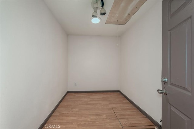 unfurnished room featuring light hardwood / wood-style floors