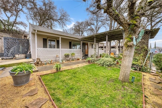 view of front of home with a front yard