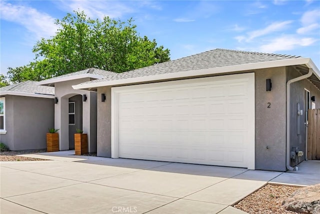 ranch-style house featuring a garage