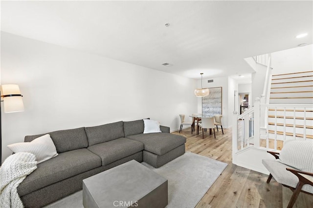 living room with light hardwood / wood-style floors