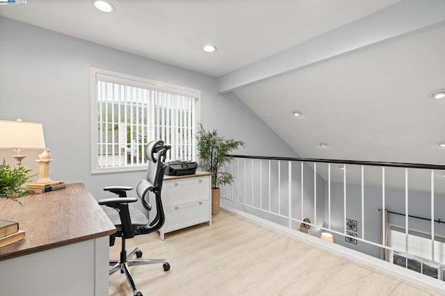 home office featuring vaulted ceiling with beams and light wood-type flooring