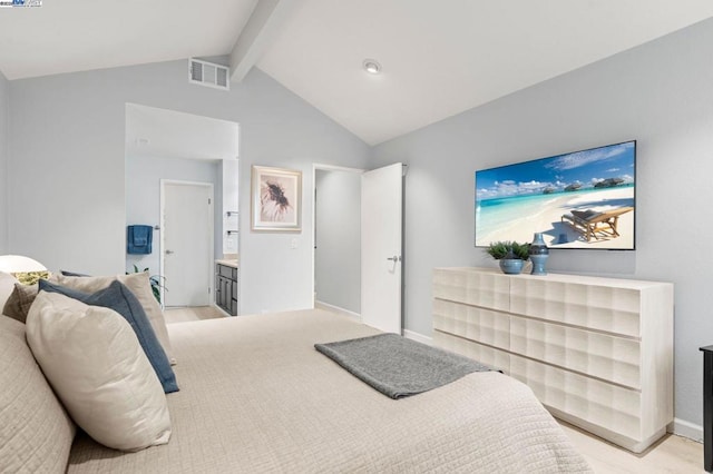 bedroom featuring lofted ceiling with beams and light wood-type flooring