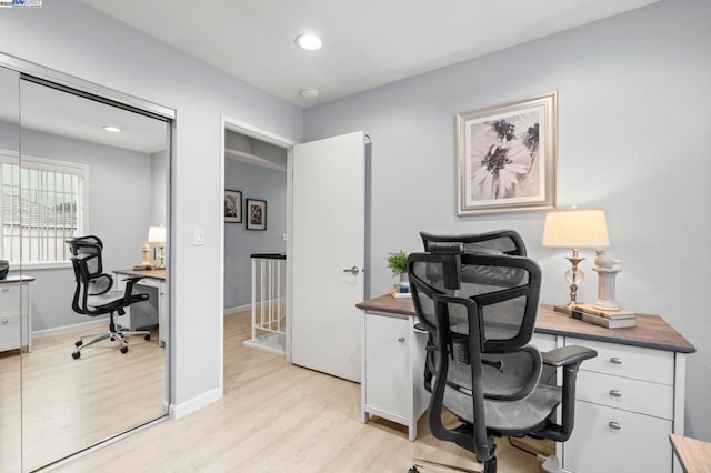 home office featuring light hardwood / wood-style floors