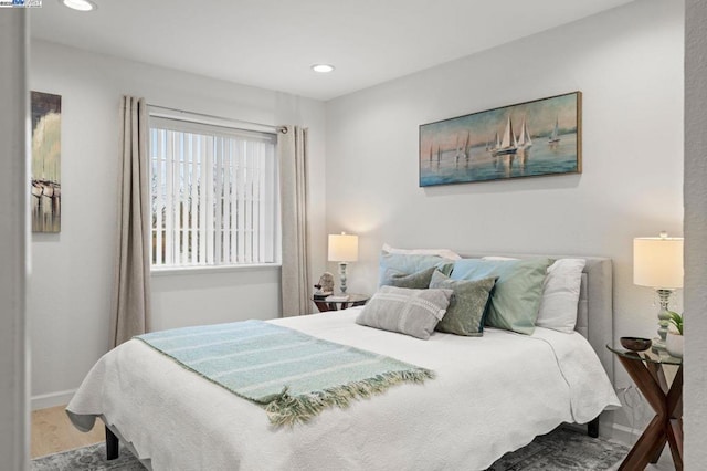 bedroom featuring hardwood / wood-style floors