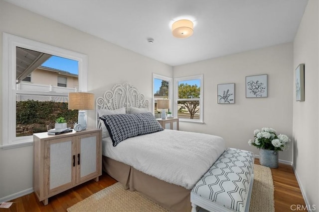 bedroom featuring hardwood / wood-style flooring