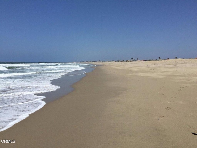 water view featuring a beach view