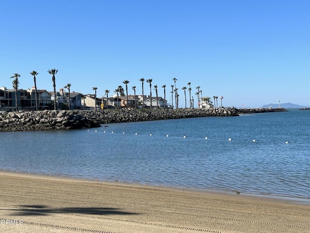 property view of water featuring a view of the beach