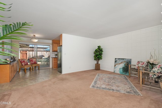 living area featuring light colored carpet