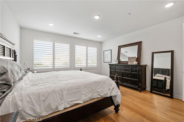 bedroom with light hardwood / wood-style floors