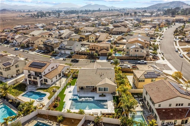 bird's eye view with a mountain view