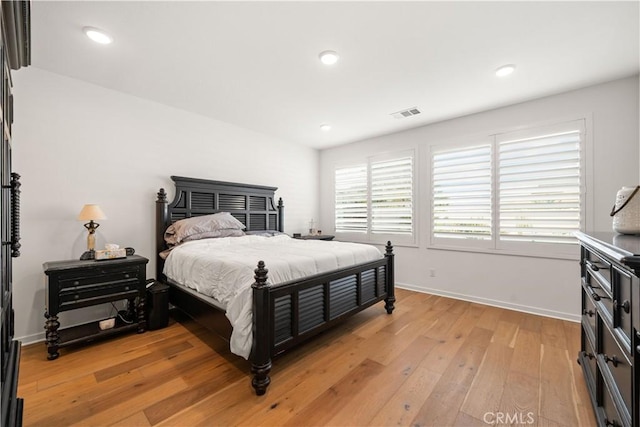 bedroom featuring light hardwood / wood-style floors