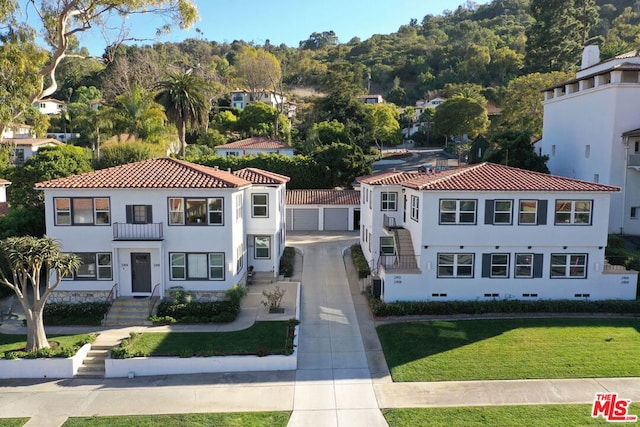 exterior space with a front lawn